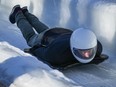 Prince Harry, the Duke of Sussex, slides down the track on a skeleton sled during an Invictus Games training camp, in Whistler, B.C., Thursday, Feb. 15, 2024. Invictus Games Vancouver Whistler 2025 is scheduled to take place from Feb. 8 to 16, 2025 and will for the first time feature winter sports.