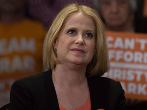 Then-NDP candidate Lisa Beare listens during a campaign stop in Surrey, B.C., on May 8, 2017.