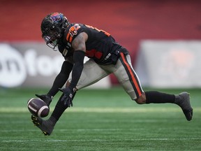 B.C. Lions' Marcus Sayles nearly intercepts a Montreal Alouettes pass during the second half of a CFL football game, in Vancouver, B.C., Sunday, July 9, 2023.