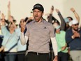 Nick Taylor, of Canada, celebrates a regulation-tying birdie putt on the 18th hole, forcing a playoff with Charley Hoffman, during the final round of the Phoenix Open golf tournament Sunday, Feb. 11, 2024, in Scottsdale, Ariz.&ampnbsp;Taylor is developing a reputation as one of the PGA Tour's most clutch players and he's loving it.