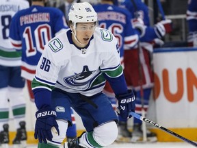 Vancouver Canucks' Andrei Kuzmenko (96) during the first period of an NHL hockey game against the New York Rangers Monday, Jan. 8, 2024, in New York. Calgary Flames general manager Craig Conroy knows the importance of fresh starts and believes that's what newly acquired forward Andrei Kuzmenko needs as well.