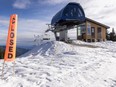 A skier slides through slushy snow at Whistler, B.C., Friday, Dec. 29, 2023. B.C. ski resorts are looking for ways to mitigate the impacts of climate change.