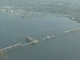 Parts of the Francis Scott Key Bridge remain after a container ship collided with a support Tuesday, March 26, 2024 in Baltimore. The major bridge in Baltimore snapped and collapsed after a container ship rammed into it early Tuesday, and several vehicles fell into the river below. Rescuers were searching for multiple people in the water.