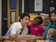 Prime Minister Justin Trudeau chats with children at a child care at Don Christian Recreation Centre in Surrey, B.C on Thursday, March 28, 2024.