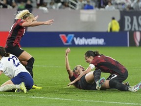 Canada's Jordyn Huitema, second from right, celebrates with teammate Jessie Fleming, right, after scoring a goal against the United States during the second half of a CONCACAF Gold Cup women's soccer tournament semifinal match, Wednesday, March 6, 2024, in San Diego. The Canadian women climbed one spot to No. 9 in the FIFA rankings released Friday.
