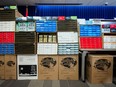 Two pallets of tobacco products are put on display in Surrey on March 8 during an RCMP news conference announcing the results of the latest enforcement actions against organized crime groups involved in the trafficking of contraband tobacco.