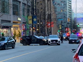 Police closed off Robson between Homer and Richards streets Saturday evening. Vancouver police confirmed there had been a targeted shooting in Downtown Vancouver. Douglas Quan photo.