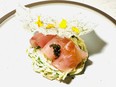 Isaki, or chicken grunt fish, served pinkish and delicately rolled, dabbed with caviar, and served atop a mound of julienned celeriac remoulade with a rice cracker.