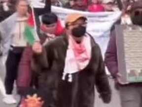 Vancouver police are seeking help to identify the woman in this photo. Police allege a woman assaulted a police constable during a protest on March 2.