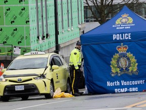 ancouver RCMP on scene of a fatal pedestrian accident involving a taxi Saturday morning, March 9, 2024. (Photo by Jason Payne/ PNG)