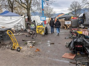 Campers at CRAB Park Friday, March 22, 2024. Unless they move voluntarily to a designated area by Monday they will be removed by Metro staff. The area they are camping has become unhygienic with significant amounts of debris.