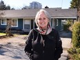 Shishalh Nation Chief Lenora Joe, whose Shishalh name is yalxwemult, in front of one of 10 houses that will be transported from Port Moody to the Shishalh Nation in Sechelt.