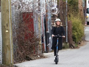 Vancouver city councillor Sarah Kirby-Yung in action on a scooter for hire, in Vancouver, B.C., on March 7, 2024.
