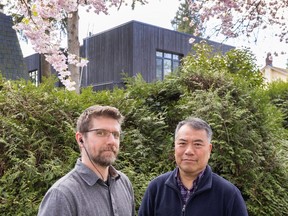 Construction manager, Dan Butler and Arthur Lo, of Insightful Healthy Homes at the home that may well be the most sustainable in Canada.