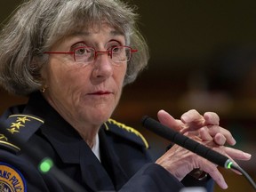 Anne Kirkpatrick talks with members of the New Orleans City Council during her confirmation hearing at city hall in New Orleans, Wednesday, Oct. 11, 2023. Kirkpatrick says conditions at the department's aging headquarters are so deplorable that officers work amid heavy mold, cockroaches and even rats munching on contraband in the evidence locker.