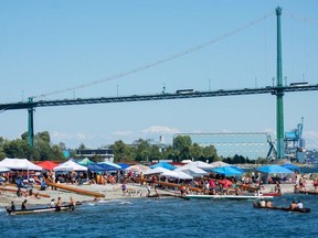 Spectators and paddlers gather for the Swa?ywey? (Ambleside Beach) Canoe Races hosted by Squamish Nation July 1, 2023. Nick Laba / North Shore News