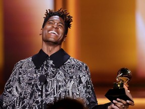 LAS VEGAS, NEVADA - APRIL 03: Jon Batiste accepts the Album Of The Year award for 'We Are' onstage during the 64th Annual GRAMMY Awards at MGM Grand Garden Arena on April 03, 2022 in Las Vegas, Nevada.