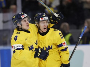 File photo: Sweden's forward Jonathan Lekkerimaki (R) celebrates with Sweden's defender Axel Sandin Pellikka after scoring during the semi-final match between Sweden and Czech Republic of the IIHF World Junior Championship in Gothenburg, Sweden on January 4, 2024.