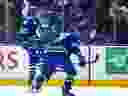 The Vancouver Canucks' Dakota Joshua celebrates his third-period goal with Filip Hronek against the against the Nashville Predators in game 1 of the First Round of the 2024 Stanley Cup Playoffs  at Rogers Arena on April 21, 2024.