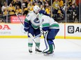 Ian Cole #82 and Casey DeSmith #29 of the Vancouver Canucks share a hug after the 2-1 win against the Nashville Predators in game three of the First Round of the Eastern Conference NHL Stanley Cup Playoffs at Bridgestone Arena on April 26, 2024 in Nashville, Tennessee.