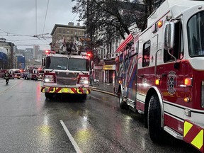 Crews from Vancouver Fire Rescue Services attend a fire in an SRO building on East Hastings Street between Main and Gore on Monday, April 8, 2024.