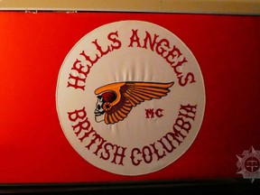A man arrested last October north of Kamloops had more than five kilograms of cocaine, three firearms and Hells Angels "support propaganda" in his truck, a lawsuit filed by the B.C. government alleges.