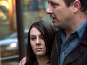 The Parole Board of Canada has granted overnight leaves and extended day parole for a British Columbia woman convicted in the 1997 swarming and murder of Victoria teenager Reena Virk. Kelly Ellard and her father, Lawrence, leave the Vancouver courthouse for dinner, March 30, 2000.