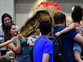 JoJo the dino gets some love at Jurassic Quest, coming to Pacific Coliseum May 2-5.