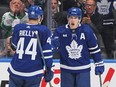 Mitch Marner of the Maple Leafs celebrates a goal against the Boston Bruins with teammate Morgan Rielly in Game Four at Scotiabank Arena on April 27, 2024 in Toronto.