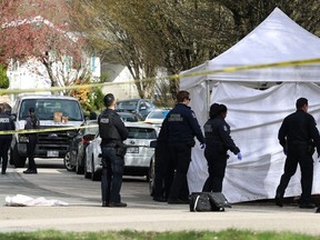 Vancouver police on scene after a body's found at Rosemont Dr and 57th Ave in Vancouver, B.C., on April 3, 2024. (NICK PROCAYLO/PNG)