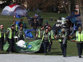 Vancouver park rangers have dismantled tents located in a temporary area at CRAB Park on Monday, following an extensive clean-up of a nearby sanctioned homeless camp earlier this month.