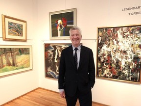 Robert Heffel of the Heffel Gallery with some works by Emily Carr, left,, Gordon Smith, centre top, Lawren Harris, centre bottom, and Jean Paul Riopelle, right, that were in the collection of the late art dealer Torben Kristiansen. Thirty paintings from the Kristiansen collection will go up for sale at a May 23 Heffel auction in Toronto. There is a preview of the auction at the Heffel Gallery at 2247 Granville St. in Vancouver from April 18-24.