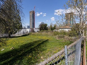 Vacant land beside Whalley Boulevard in Surrey. Surrey tops the list with the highest number of vacant lots where there are no residential structures. The federal government said it's considering a tax for land that is zoned for residential use, and will hold consultations later this year.