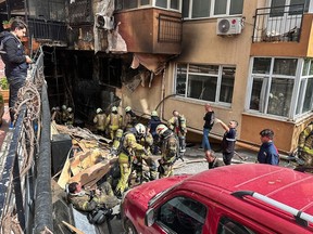 Firefighters work after a fire broke out at a nightclub in Istanbul, Turkey, Tuesday, April 2, 2024.