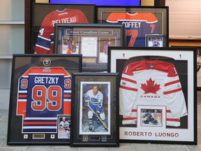 The recovered sports memorabilia included a framed Roberto Luongo Team Canada jersey, a framed Wayne Gretzky Edmonton Oilers jersey, framed photos of boxer Muhammad Ali, signed football helmets and more.