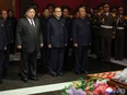 This picture taken and released on May 8, 2024 from North Korea's official Korean Central News Agency (KCNA) via KNS shows North Korea's leader Kim Jong Un (C) and senior officials expressing their condolences to former Workers' Party of Korea Vice Chairman Kim Ki Nam, who died at the age of 94 on May 7, during a service in Pyongyang. North Korea's former propaganda chief, credited with masterminding the personality cult surrounding the ruling Kim dynasty, has died, state media said on May 8, with leader Kim Jong Un attending his funeral. (Photo by KCNA VIA KNS / AFP) / South Korea OUT / REPUBLIC OF KOREA OUT