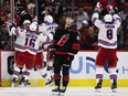 Members of the New York Rangers celebrate the game winning goal against the Carolina Hurricanes in the first overtime in Game 3 of the Second Round of the 2024 Stanley Cup Playoffs at PNC Arena on May 09, 2024 in Raleigh, North Carolina.