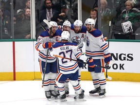 Zach Hyman #18 of the Edmonton Oilers celebrates with teammates after his goal against the Dallas Stars during the second period in Game One of the Western Conference Final of the 2024 Stanley Cup Playoffs at American Airlines Center on May 23, 2024 in Dallas, Texas.