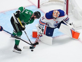 Stuart Skinner #74 of the Edmonton Oilers tends goal against Jamie Benn #14 of the Dallas Stars during the second period in Game Two of the Western Conference Final of the 2024 Stanley Cup Playoffs at American Airlines Center on May 25, 2024 in Dallas, Texas.