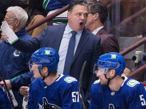 Travis Green while head coach of the Vancouver Canucks in 2021.