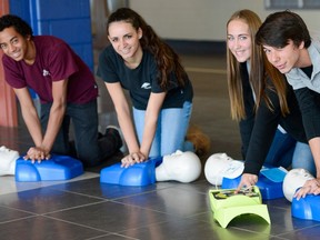 High school students learn CPR at school. Photos courtesy the ACT Foundation.