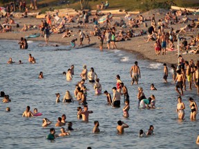 Beachgoers on Kitsilano Beach during a heat wave in Vancouver on June 28, 2021.