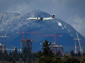 Virtually all the construction cranes we now see across Metro Vancouver, from Oakridge’s luxury condos in Vancouver (photo) to Brentwood’s needle towers in Burnaby, were conceived five to 10 years ago, when borrowing was cheap. Times have changed. (Photo: April 11, 2023.)