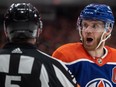 Edmonton Oilers' Connor McDavid (97) argues with the referee during the second period on Sunday night.