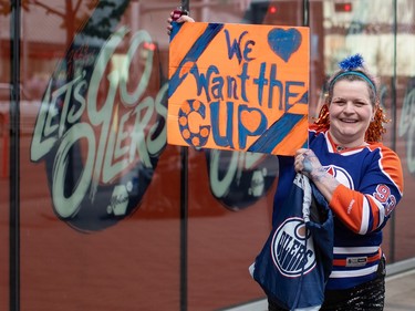 An Oilers fan shows her support for the Edmonton Oilers as they take on the Vancouver Canucks during second-round NHL playoff action in Edmonton on Tuesday May 14, 2024.THE CANADIAN PRESS/Jason Franson