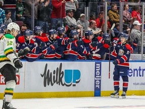 Saginaw Spirit enjoyed a historic season in 2023-24, being one of four teams in the Canadian Hockey League to win 50 games en route to crossing the 100-point plateau for the first time in the team's 22-year history with 102. Spirit's Michael Misa (77) celebrates a goal with teammates during OHL hockey action against the London Knights, in Saginaw, Mich., in an April 29, 2024, handout photo.