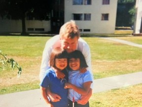Michelle Wright, left, with her family in Vancouver's Little Mountain housing project, around 1998.
