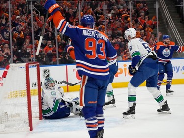 Edmonton Oilers' Leon Draisaitl (29) celebrates his goal on Vancouver Canucks' goalie Arturs Silovs (31) during first period second-round NHL playoff action in Edmonton on Tuesday, May 14, 2024 in Edmonton. Greg Southam-Postmedia