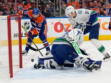 Vancouver Canucks' goalie Arturs Silovs (31) stops Edmonton Oilers' Leon Draisaitl (29) from scoring during first period second-round NHL playoff action in Edmonton on Tuesday, May 14, 2024 in Edmonton. Greg Southam-Postmedia