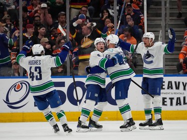 Vancouver Canucks' Brock Boeser (6) celebrates his goal with teammates against the Edmonton Oilers during third period, second-round NHL playoff action in Edmonton on Tuesday, May 14, 2024 in Edmonton. Greg Southam-Postmedia